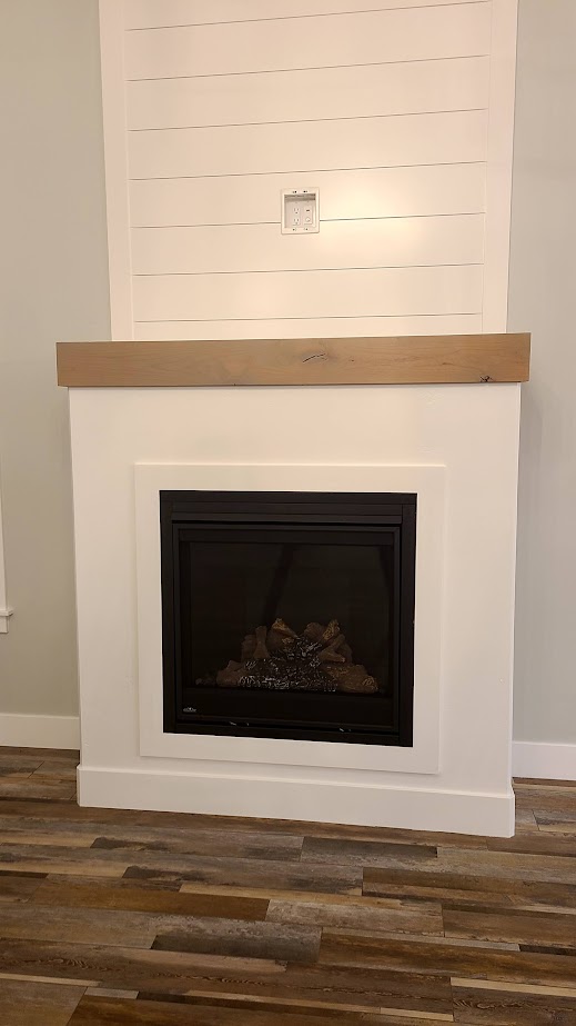 custom fireplace mantle installed in an Idaho home